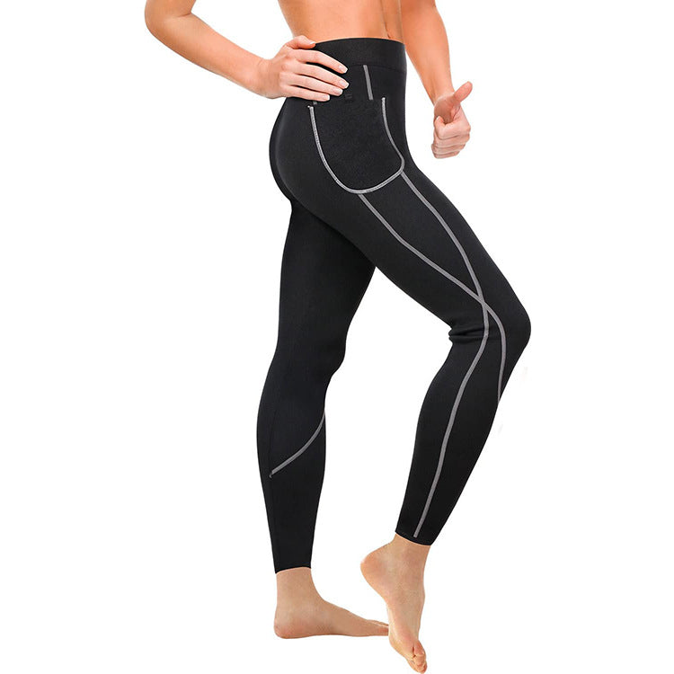 Black high-waist compression leggings with contrast stitching and slim athletic fit. 