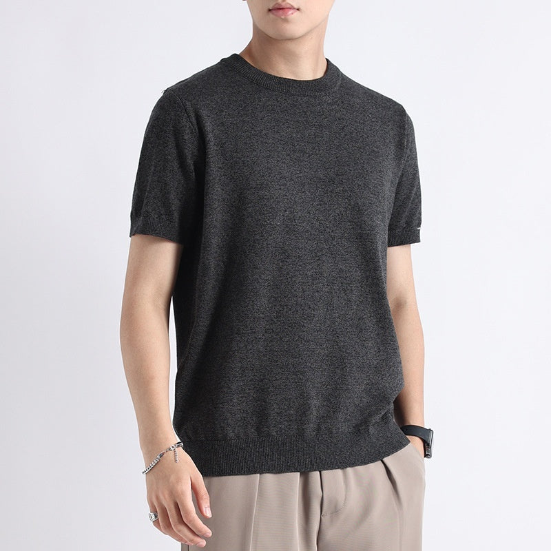 Men wearing a charcoal gray short sleeve knit top with crew neck and slim fit design.