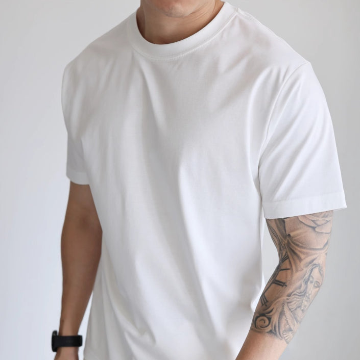 Men wearing a black crew neck short-sleeve T-shirt. 