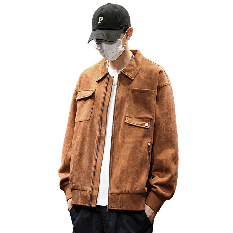 Olive green men’s zip-up utility jacket with collar, chest pockets, and ribbed cuffs.