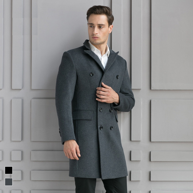 Dark grey men’s double-breasted long overcoat with button detailing and peak lapel.