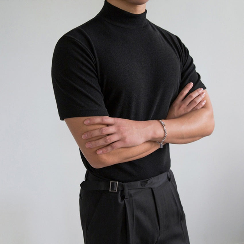 Men wearing black short sleeve mock neck t-shirt with slim fit.