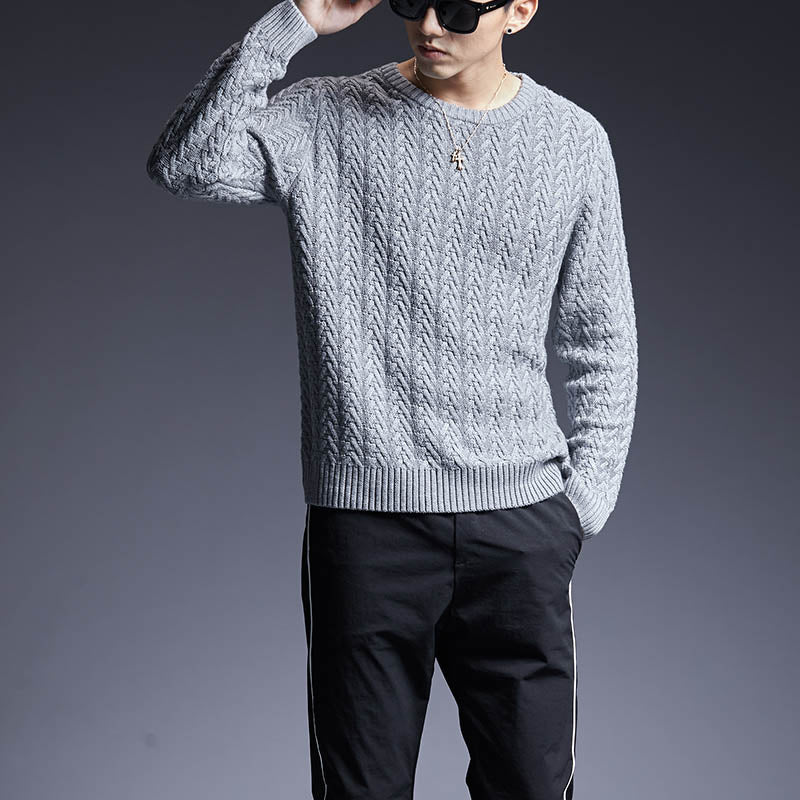 Men’s black textured knit crewneck sweater with ribbed hem, collar and cuffs. 

