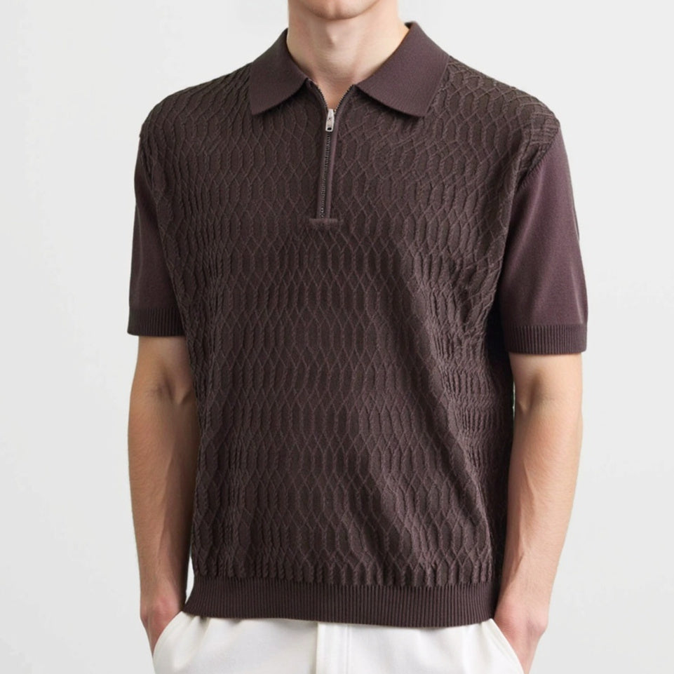 Man wearing a brown textured knit short sleeve polo shirt with zip collar.