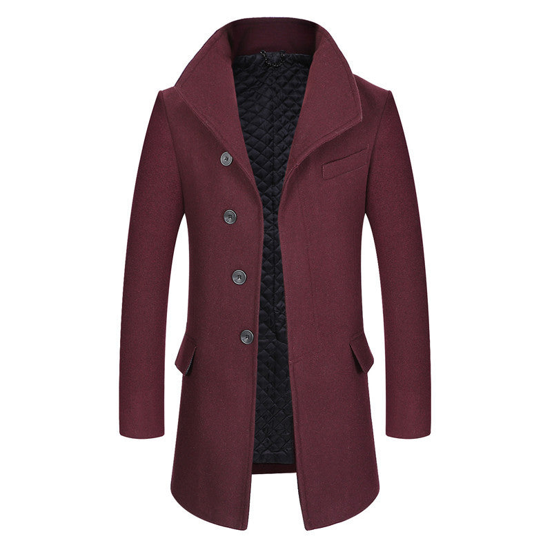 Burgundy men’s wool overcoat with stand collar, button front, and quilted inner lining. 