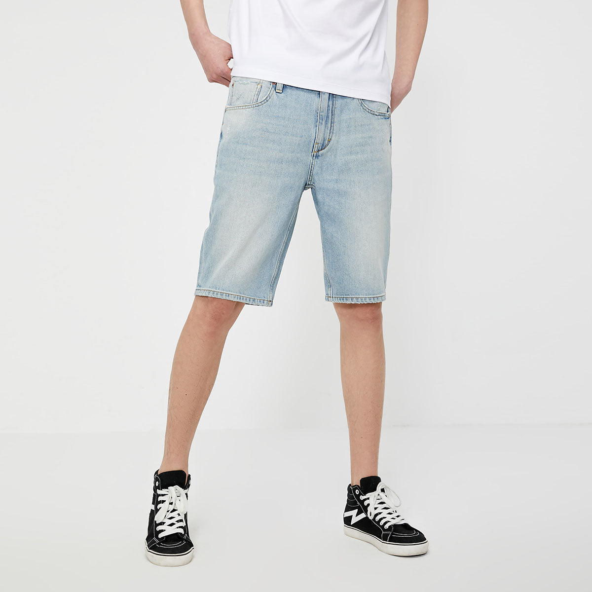 Light men’s denim shorts with a five-pocket design. 