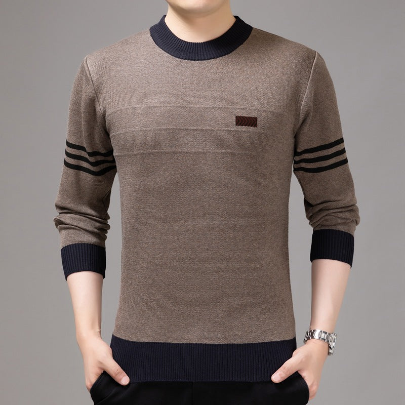 Man wearing a brown knit crewneck sweater with subtle sleeve stripe details.