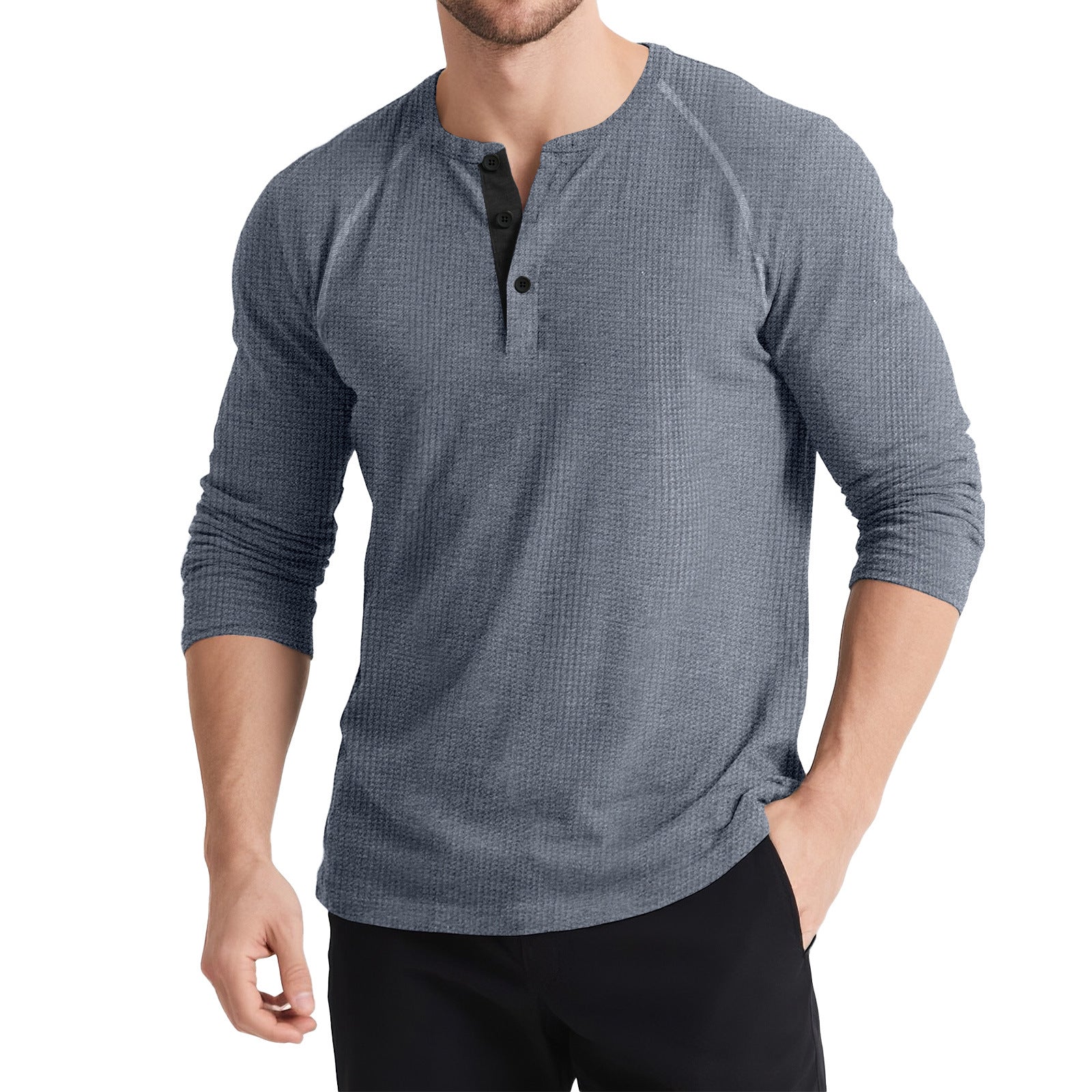 Men wearing a gray long sleeve waffle knit Henley shirt with a three button neckline. 